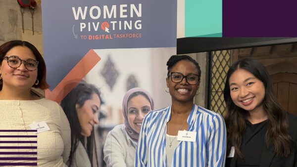 Joann, Alicia and Carol standing in from of the Women Pivoting to Digital Taskforce banner