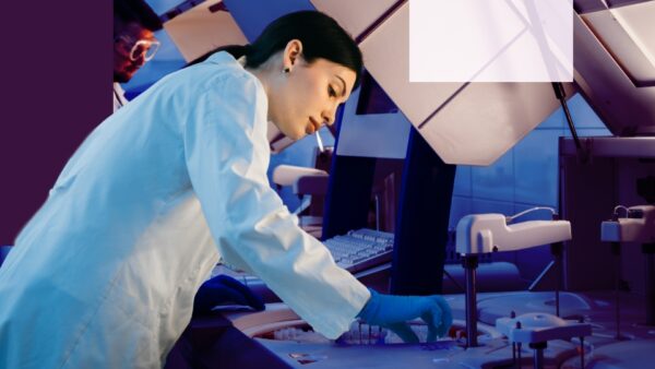 A woman examining something at a medical lab with rubber medical gloves.