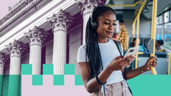 A woman using her phone on public transportation